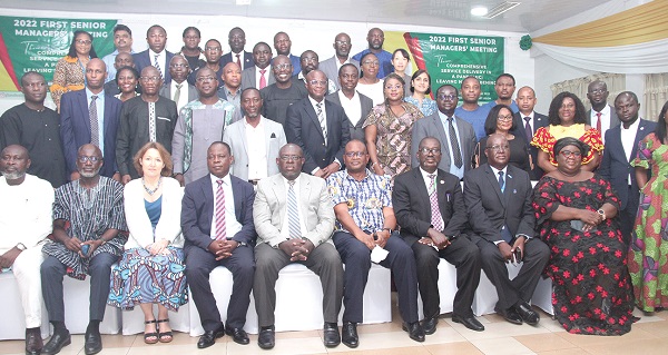 Dr Sefah Bediako (middle), Ghana Health Service Council Chairman, with Dr Patrick Puma-Aboagye (4th from left), Director-General, Ghana Health Service, Dr Delanyo Dovlo (4th from right), Ghana College of Physicians and Surgeons, Kwabena Boadu Oku-Afari (3rd from right), Chief Director, Ministry of Health and other invited participants after the meeting. Picture: BENEDICT OBUOBI